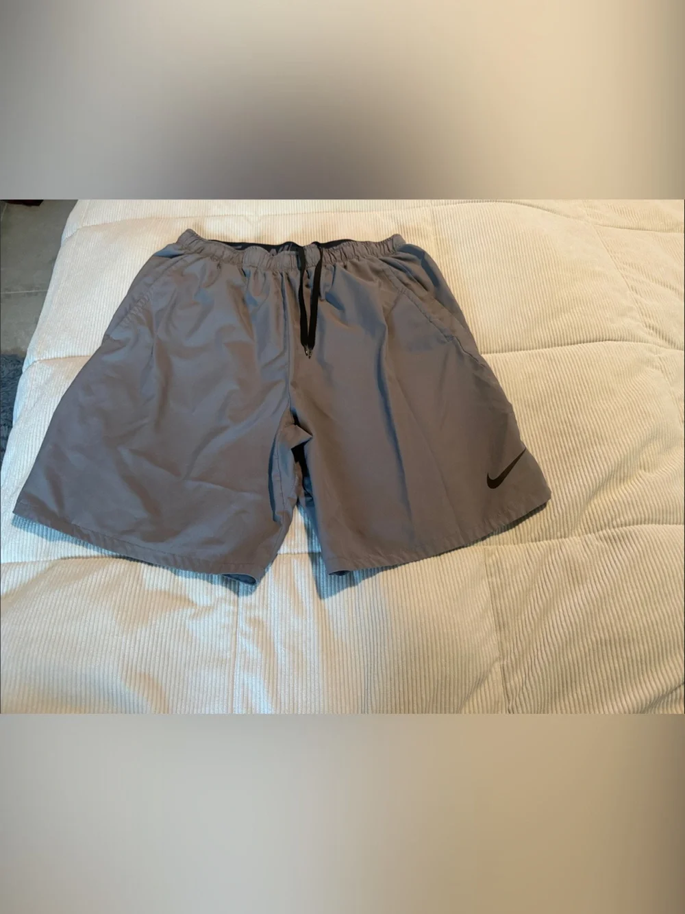Nike Men's Light Gray Athletic Shorts with Black Swoosh